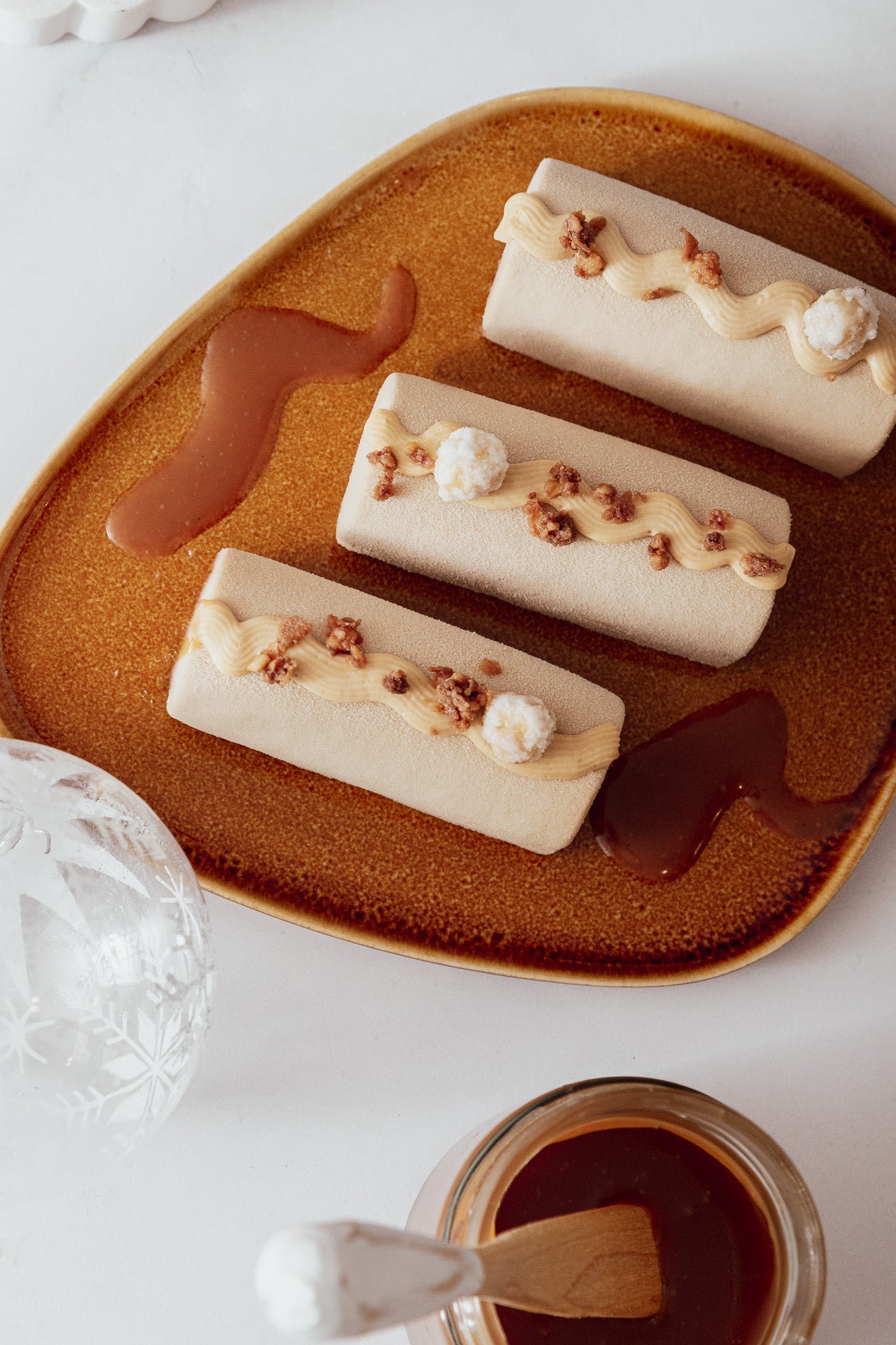 Bûchette des fêtes 2025 - Praliné, chocolat et caramel